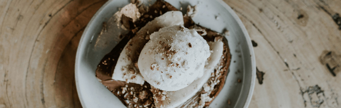 Butter Pecan Ice Cream in White Dish